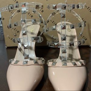 Maple sugar pointy toe heel, w/Clear studded straps.